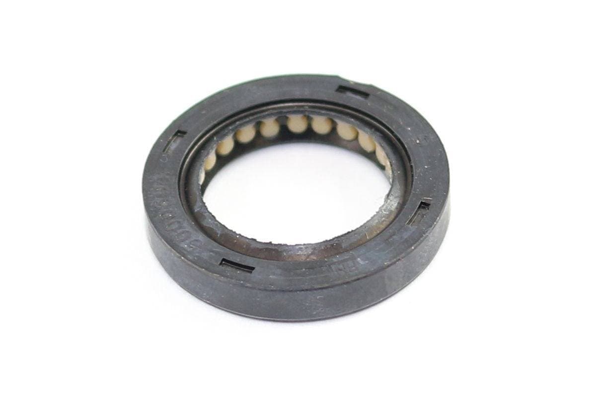 Genuine Bobcat Oil Seal 6678226 showing flat side.