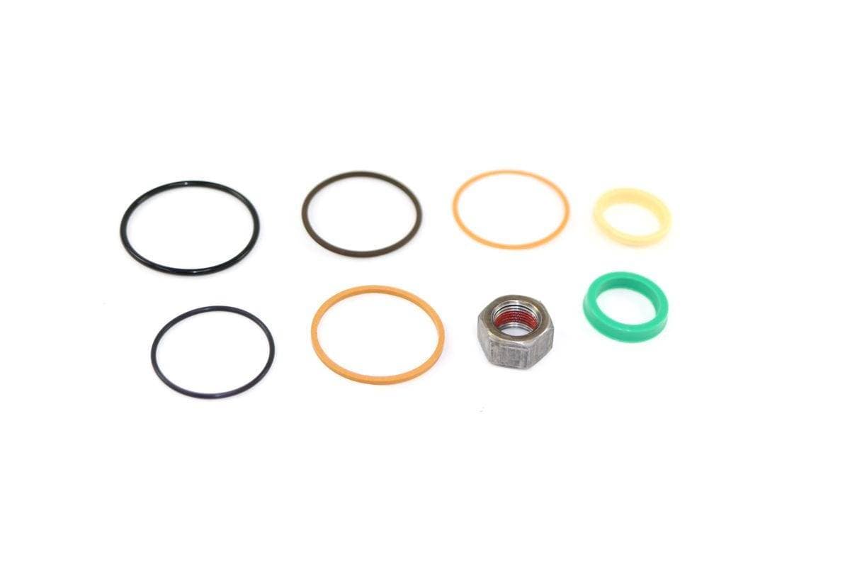 Genuine Bobcat Seal Kit 7137866 showing all seals and nut included in the kit.