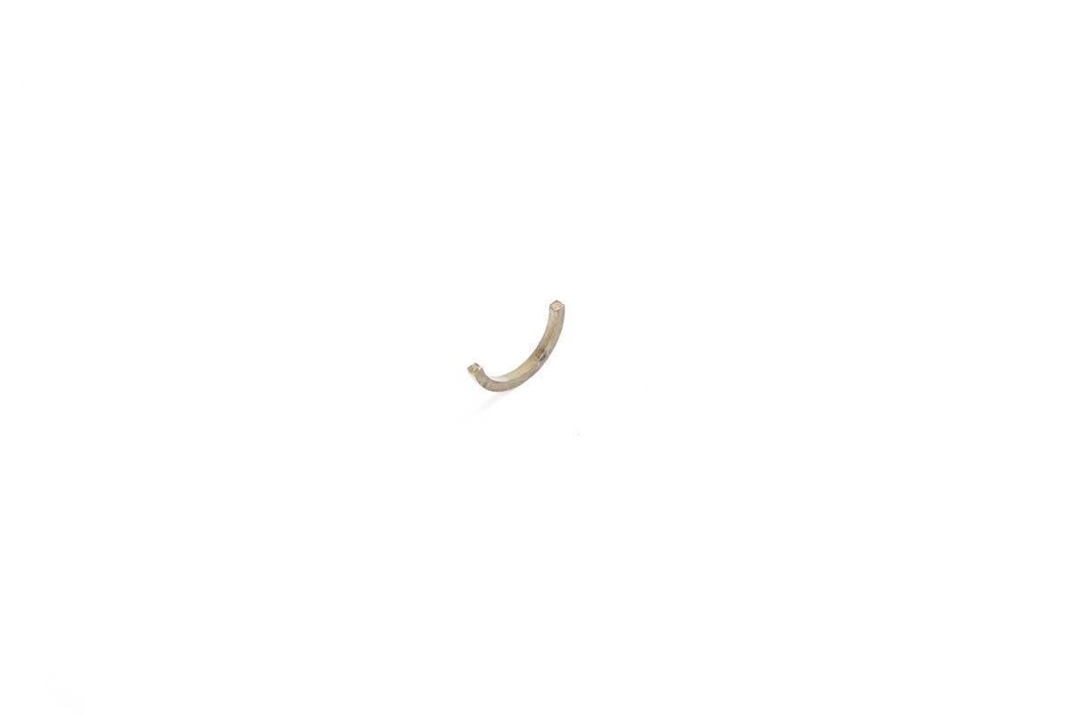 Genuine Bobcat Retainer Half, 7002094 showing the curved half and thickness.