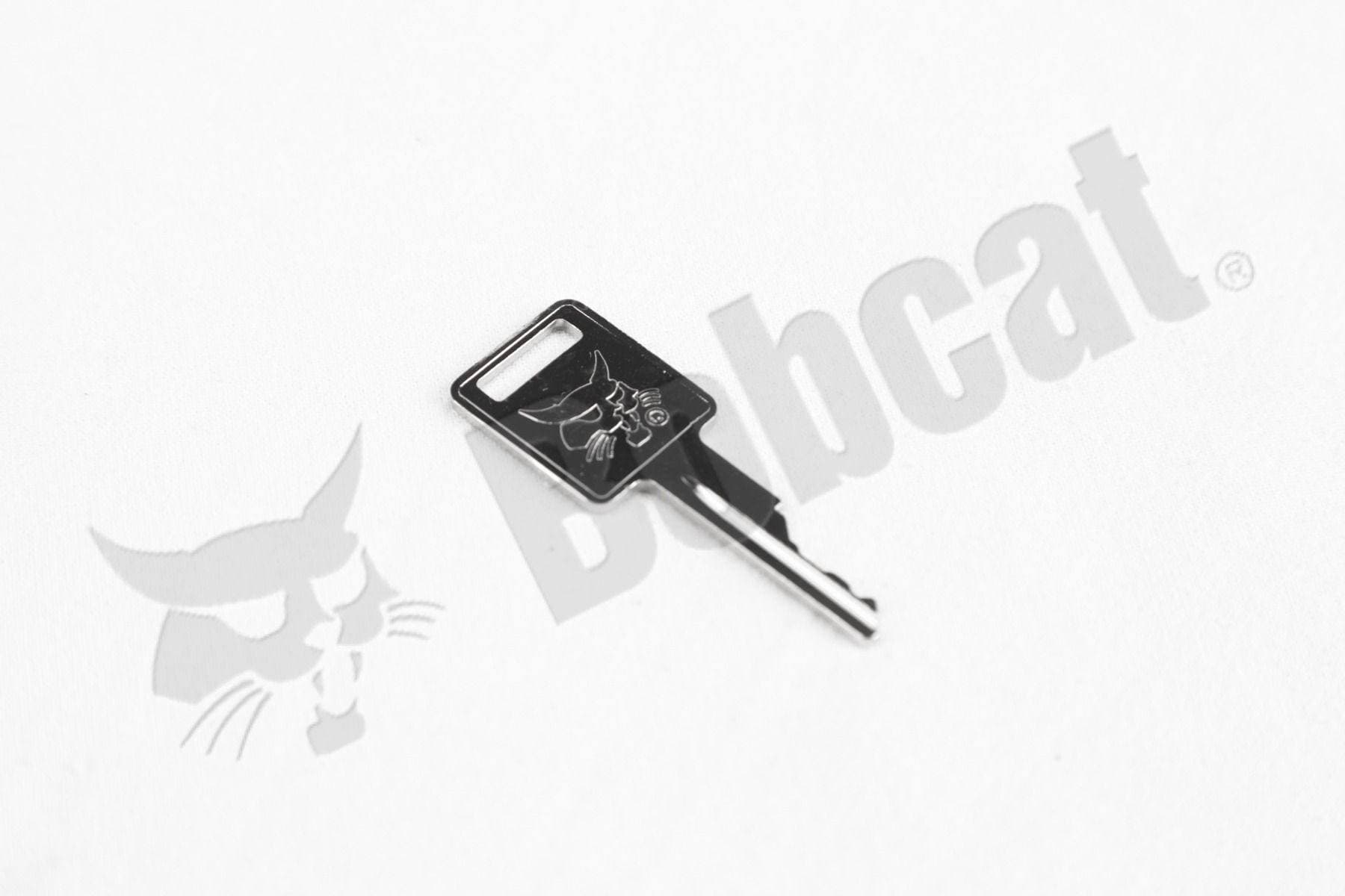 Genuine Bobcat Ignition and Door Key embossed with Bobcat head logo.